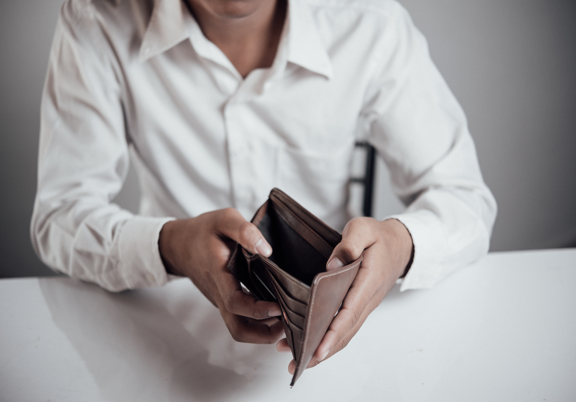 businessman saving money,Man carrying a wallet in hand, the dollar,finance accounting concept