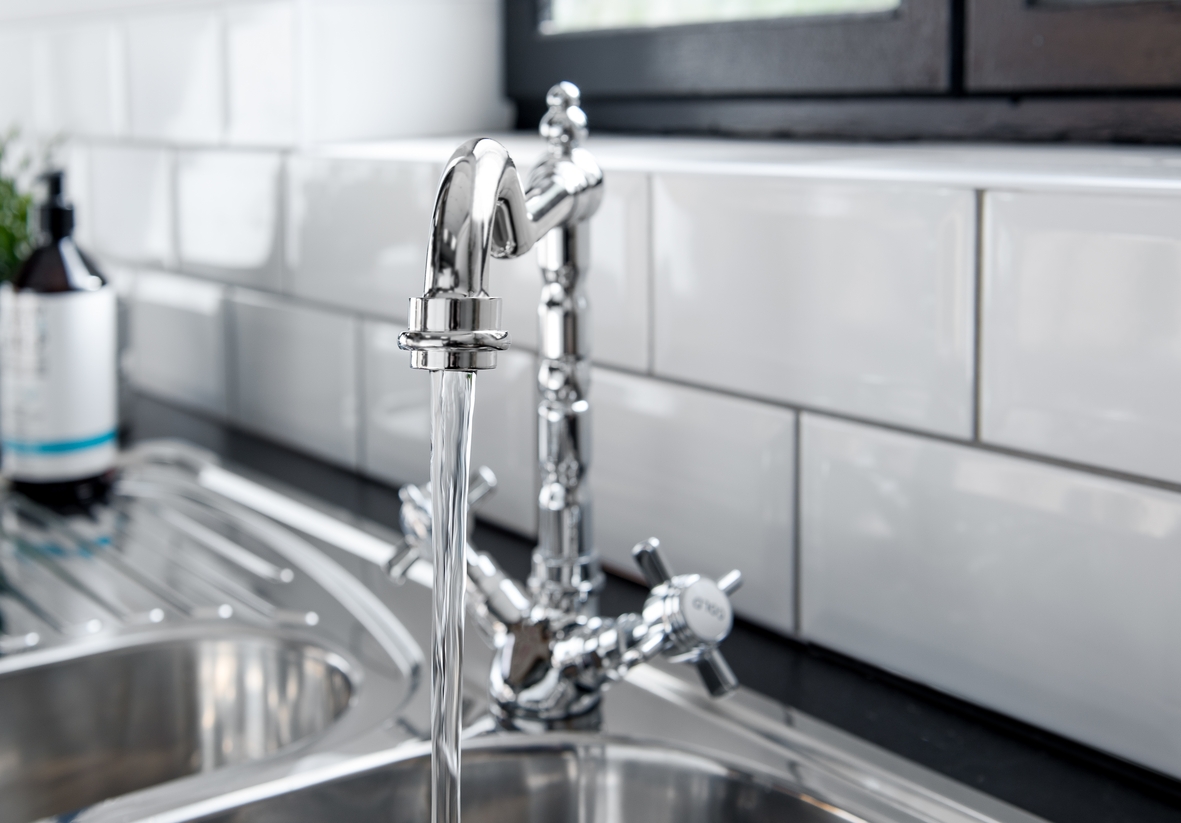 New and modern steel faucet in the kitchen