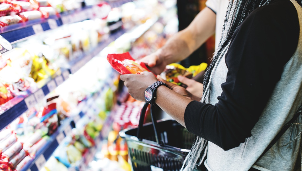 A couple shopping for food
