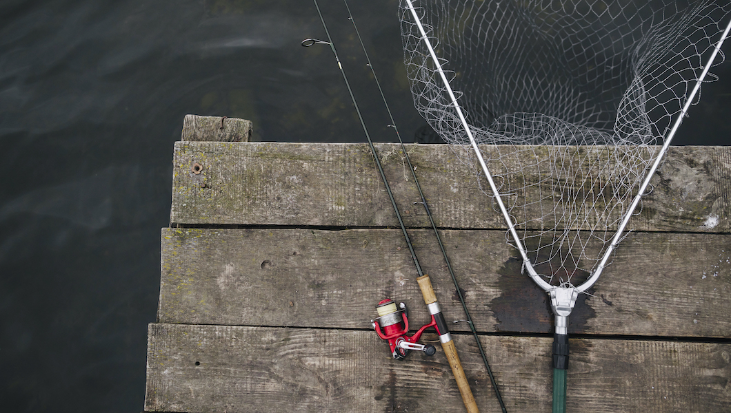 fishing-rod-fishing-net-edge-wooden-pier-lake